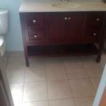 STAND ALONE VANITY WITH NEW FLOOR TILE